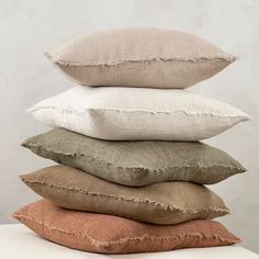 four pillows stacked on top of each other