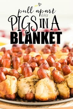 a platter full of pigs in a blanket with text overlay that reads pull apart pigs in a blanket