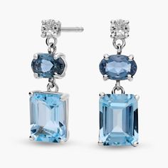 You'll love the interplay of soft and rich colors between the different gems on these beautiful blue topaz and white sapphire drop earrings. Modern Blue Earrings With Gemstone Accents, Sapphire Drop Earrings, Precious Gemstones Jewelry, Topaz Earrings, Rich Colors, White Sapphire, Semi Precious Gemstones, Beautiful Blue, Gemstone Earrings