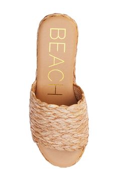 Give your warm-weather looks a boost with this summery sandal boasting a raffia top strap, wedge heel and platform. 3" heel; 1 3/4" platform Raffia upper/synthetic lining and sole Imported Chic Natural Heels For Beach, Chic Natural Heels For The Beach, Beach Heels In Natural Color Synthetic Material, Chic Wedge Sandals For Beach Vacation, Natural Straw Wedge Heel Sandals, Natural Synthetic Heels For Beach, Beach-appropriate Natural Color Synthetic Heels, Vacation Wedge Sandals With Block Heel, Natural Sandals With Stacked Heel For Vacation