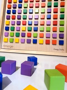 an abacusk with colorful cubes sitting next to it