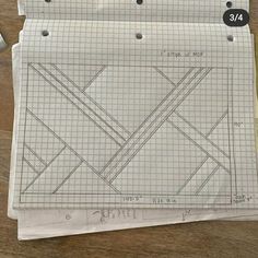 three pieces of graph paper on top of each other