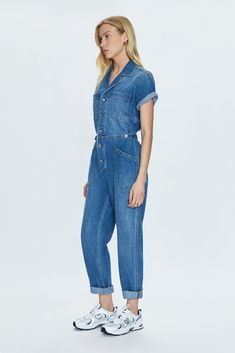 All-in-one outfitting, expertly realized in our best selling jumpsuit silhouette. Designed for a relaxed fit, with a button up bodice and waist for adjustable coverage and fit options. Offered in a medium blue denim wash define by an allover laser dot motif. 100% Cotton Best Swimwear, Denim Jumpsuit, Romper Pants, Medium Blue, Denim Wash, Short Pants, Sweater Top, Dress Skirt, Jumpsuit Romper