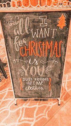 a chalkboard sign that says all i want for christmas is you