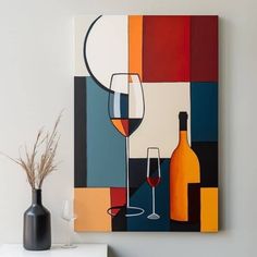 a painting on the wall next to a vase with a wine glass and bottle in it