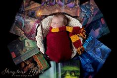 a newborn baby wrapped in a harry potter blanket surrounded by hogwart's books