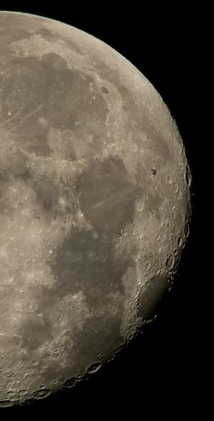 the full moon is seen in this black and white photo, taken from earth's orbit