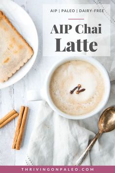 a cup of coffee and cinnamon sticks on a white table with the words app chai latte