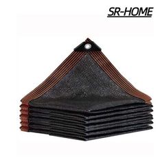 a stack of black and brown cloths with the words sr - home on it