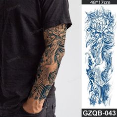 a man with tattoos on his arms and arm is standing in front of a white background