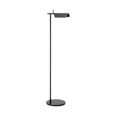 a black floor lamp on a white background