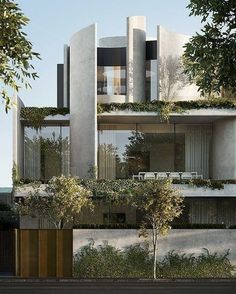 an artist's rendering of a modern house with trees and bushes on the outside