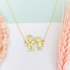 Kids Figure Names Necklace 1 Boy 1 Girl, Children Name Necklace For Mom, Kids Shape Name Necklace For Mother, Birthday Gift For Mom 🔎 Material: in 925 sterling silver and 14k solid gold ⛓️📏 Chain length: 17.7 inches (45cm), 19.6 inches (50cm), 21,6 inches (55cm) ⛓️ Chain Style: Cable 🎨 Color: rose, silver, gold 🔖 You can choose your preferences from the options ✈️ Ships in 48 hours 🎁 We send it in a wonderful presentation in a wood gift box, certificate, wiping cloth, cute carrying case. ↘️ Cute Sterling Silver Charm Necklace For Birthday, Sterling Silver Charm Name Necklace For Birthday, Customizable Cute Charm Necklaces For Birthday, Cute Nickel-free Necklace For Birthday, Charms Name Necklace For Birthday And Mother's Day, Name Pendant Charm Necklace For Birthday, Charm Name Necklace For Birthday And Mother's Day, Cute Personalized Name Necklaces For Birthday, Name Charm Pendant Necklaces For Birthday