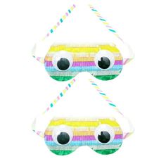 two pieces of paper with eyeballs on them, one in the shape of a rainbow