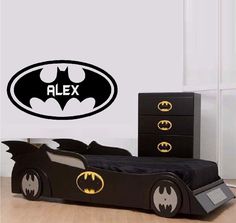 the batman bedroom is decorated in black and white