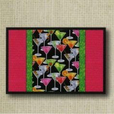 a painting of martinis on a black and pink background with green trim around the edges