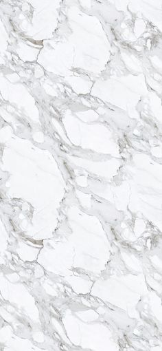 a white marble textured surface with black accents