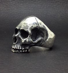 925 Sterling Silver Half Jaw Skull Ring ( XL design) I have designed a classic skull but in big size and with great detail. Finely hand carved in wax by me from scratch in my studio in Granada, Spain. Then the casting is done in 925 Sterling Silver. The finish is blackened and then polished. The interior finish is also mirror-like for greater comfort. Weighs 47 grams (almost 1,65 ounces) of 925 Sterling Silver in size 11 (US) Height is 33 mm top of skull up to the teeth Width is 26 mm (a little Granada Spain, Biker Rings, Skull Ring, Ring Sterling Silver, Etsy Items, Big Size, Band Rings, Favorite Jewelry, Sterling Silver Rings