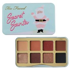 The Too Faced Secret Santa Eye Shadow Palette is the ultimate gift for makeup enthusiasts and beauty lovers looking to add a touch of magic to their holiday looks. With its exquisite range of shades curated to enhance your eyes, this palette offers endless possibilities to create stunning eye-catching looks, making it a must-have in your collection. Featuring a delightful selection of 16 vibrant, high-pigmented eyeshadows, the Secret Santa Palette guarantees a palette of possibilities to let you Gifts For Makeup Lovers, Mini Eyeshadow Palette, Santa Mini, High Pigment Eyeshadow, Office Holiday Party, Nude Eyeshadow, Pigment Eyeshadow, Stunning Eyes, Eye Shadow Palette