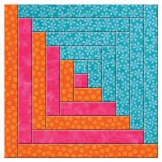 an orange and blue quilt with squares in the shape of rectangles on it