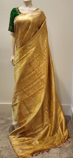 Beautiful Kanchi Silk in Gold Saree W/ Custom Blouse. For Custom Blouse Pls contact us. Free Shipping within the US. Saree ships immediately within the US and the Blouse 2 weeks later. Custom blouse stitching $35. Work blouse available for $99, which shown in the picture. Golden Colour Saree With Contrast Blouse, Blouse For Golden Saree, Gold Saree Contrast Blouse, Gold Colour Saree Contrast Blouse, Long Sleeve Blouse Piece With Zari Weaving For Wedding, Wedding Long Sleeve Blouse With Zari Weaving, Elegant Long Sleeve Blouse With Zari Weaving, Elegant Silk Blouse With Zari Weaving, Tissue Silk Blouse For Wedding