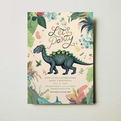 a children's book with an image of a dinosaur on the cover and flowers around it