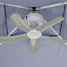 Canopy Breeze canopy fan is the first rechargeable ceiling fan for portable canopies and more! Perfect for tailgating, youth sports, camping, crafts fairs and more on warm days. Ideal for use when wind is below 10 mph, the fan has four hooks that attach to the frame of most 10 and 12 canopies where roof joists are perpendicular at their apex (X shape). It also has a hoop at the top that allows one to suspend the fan from a single hook, making it compatible with pergolas, gazebos, workshops, etc. Roof Joist, Tent Fan, Portable Canopy, Wall Mounted Fan, Tent Accessories, Youth Sports, Canopy Outdoor, Roof Framing, Camping Crafts