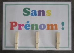 there is a sign that says sans premom on it with clothes pins attached to it