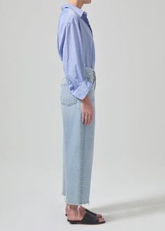 Inspired by our best-selling Ayla silhouette, the Ayla raw hem crop offers a relaxed rise, easy leg and cropped inseam. Style back to a classic white shirt for elevated ease. This style is true to size and intended to sit relaxed at the natural waist. For a higher and closer fit, we recommend sizing down. Looks Like: Light, vintage indigo with soft fading and whiskeringFeels Like: Mighweight, non-stretch cotton with roomy drape for all-day wearability This product is made with regenerative cotto Everyday Summer Cropped Jeans With Straight Hem, Spring Cropped Jeans With Frayed Hem, Everyday Cropped Jeans With Straight Hem For Summer, Summer Cropped Jeans With Frayed Hem, Spring Cropped Hem Denim Bottoms, Spring Denim Bottoms With Cropped Hem, Spring Cropped Bottoms With Frayed Hem, Cropped Bottoms With Frayed Hem For Spring, Relaxed Fit Cropped Jeans For Spring