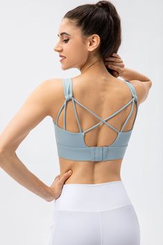 80% Nylon. 20% Spandex Soft. comfortable. skin friendly 4-way stretch. breathable and sweat-wicking Classic U-shape neckline Crisscross straps that offer intricate detailing to your look Featuring non-removable pads for built-in comfort and support Perfect for both sports activities and daily life