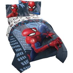 a spiderman bed set with pillows and sheets