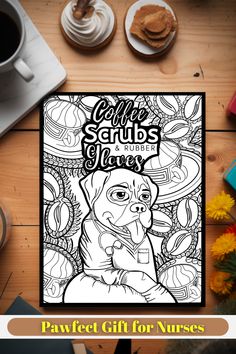 a coloring book with coffee and flowers on the table