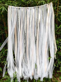 a close up of a string hanging from a tree