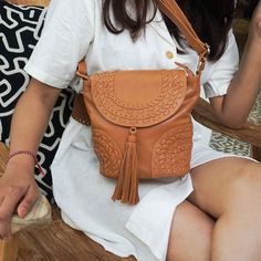 Looking for the perfect Boho handbag to take with you on all your adventures? Meet our stylish Boho Traveler Crossbody Bag! A jewel of artisan creation, this superb bohemian crossbody bag made of high-quality sheepskin leather features elegant hand-woven ornamental details for a genuine vintage bohemian feel and a Wild Boho vibe! ~ We love the stylish design of intricate handwoven patterns, the softness of genuine sheep leather and the long tassel on the flap, adding a touch of authenticity and Bohemian Hobo Crossbody Bag, Bohemian Crossbody Hobo Bag, Bohemian Hobo Bag For Travel, Bohemian Crossbody Shoulder Bag For Travel, Bohemian Leather Hobo Bag, Bohemian Leather Pouch Bag, Bohemian Leather Hobo Bag For On-the-go, Leather Bohemian Pouch Bag, Bohemian Hobo Bag With Detachable Strap For Travel