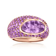 C. 2000 Vintage Roberto Coin 6.05ct t. w. Amethyst Ring Size 6.5. C. 2000. We present this enchanting ring from the designs of Roberto Coin and our Estate collection! The feminine style shines in polished 18kt rose gold and is blanketed by vibrant 2.55 ct. t. w. amethysts. A breathtaking 3.50 carat oval amethyst is the focal point of the piece, standing out in its off-center position. Includes a hidden Roberto Coin signature: a tiny gemstone as a secret gift of good wishes to every woman wearing it. 1/2" wide. Roberto Coin amethyst ring. Exclusive, one-of-a-kind Estate Jewelry. Amethyst birthstones are the perfect gift for February birthdays. High-end Vintage Amethyst Ring For Formal Occasions, Amethyst Birthstone, Good Wishes, February Birthday, Roberto Coin, Fine Jewelery, Amethyst Ring, Estate Jewelry, Feminine Style