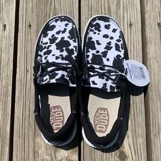 Super Cute Hey Dudes In A Black And White Cow Print. New With Tags And Box. Never Worn. Western Stuff For Christmas, Cow Print Hey Dudes, Cute Hey Dudes, Cow Print Shoes, Hay Dudes, Shoe List, Lane Frost, Black And White Cow Print, Cow Prints