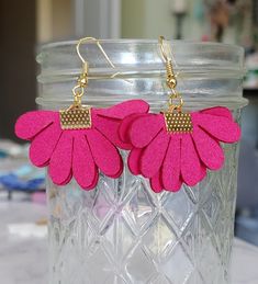 These fun and flirty earrings are playful, bright, and incredibly light weight! Wear with a casual outfit to dress it up or with more formal attire to show your fun side! Earrings hang appx 2 inches in total, flowers are 1 inch. Diy Leather Flowers, Side Earrings, Diy Leather Earrings, Leather Earring, Leather Jewellery, Black Earrings Dangle, Sunflower Earrings, Earring Designs, Egyptian Jewelry