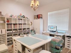 a room with many drawers and desks in it