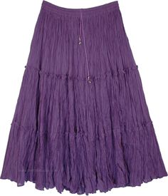 A fully flared festival skirt in a crinkled purple cotton fabric with half lining.  This tiered skirt is comfy and fashionable with its elastic waist and ethnic dori. #tlb #Crinkle #MaxiSkirt #Peasant #Dance #PurpleSkirt #CottonMidiSkirt Purple Skirts For Women, Purple Skirt Long, Purple Tiered Ruffled Skirt, Bohemian Purple Ruffled Skirt, Purple Flowy Tiered Maxi Skirt, Bohemian Tiered Purple Skirt, Bohemian Purple Tiered Skirt, Purple Cotton Tiered Skirt, Purple And Green Outfits