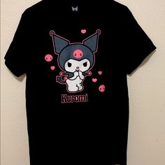 To Sanrio Fans!!! I Have Two Sizes In Stock. Size Small And X-Large. I Own In Size Medium And I Love It! They Are Super Comfortable, Loose Shirt. New Without Tags. Size: Juniors Small And X-Large Material: Cotton Fit: Regular Fit Style: Short Sleeve Color: Black Kawaii Black T-shirt With Screen Print, Cute Black Crew Neck Shirt, Kawaii Black Crew Neck T-shirt, Cute Black Short Sleeve T-shirt, Kawaii Black T-shirt With Letter Print, Cute Black T-shirt With Screen Print, Cute Black Crew Neck T-shirt, Black Cute Shirt For Streetwear, Black Cotton Kawaii Top