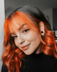 two-tone hair - black and bold orange around the face plus orange wispy fringe and waves is a unique idea that wows - Styleoholic Orange Hair Dye Ideas, Orange Balayage Hair, Orange Peekaboo Hair, Ginger Peekaboo Hair, Brown And Orange Hair, Orange And Brown Hair, Gemini Hair, Color Block Hair, Split Dyed Hair