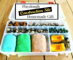 playdough construction site homemade gift in a plastic container with rocks and stones inside