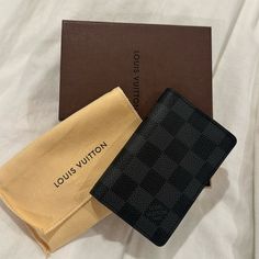 This Louis Vuitton Pocket Organizer Has Never Been Used Before And Is In Perfect Condition. It Has Custom Initials “Dg” On The Inside. It Also Comes With Its Original Dust Bag And Box. Black Wallets For Everyday Use, Modern Black Wallet With Dust Bag, Luxury Black Card Holder For Travel, Designer Black Card Holder For Everyday Use, Louis Vuitton Black, Pocket Organizer, Louis Vuitton Accessories, Wallet Organization, Custom Initials