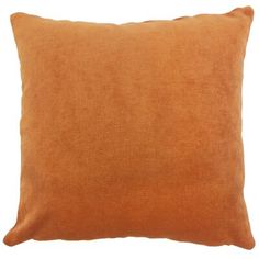 an orange pillow on a white background