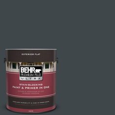 a can of behr paint on a white background