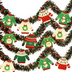 christmas sweaters and hats hanging from a garland on a white background with red, green and blue tinsel