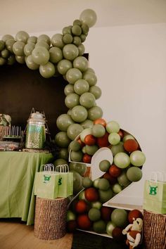 balloons are arranged in the shape of numbers on display at a birthday party or baby shower