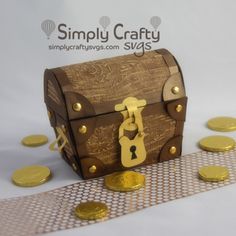 a wooden chest with gold coins around it and the words simply crafty on top