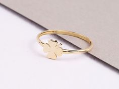 "ABOUT PRODUCT This 14K Gold Four Leaf Clover Ring is suitable gift for girlfriend, mom and her. You can even buy as a birthday gift for your friends or anniversary gifts, If you want to add a special note we can write for you and put to inside of package. We manufacture our jewelry pieces with carefully and after production we double checking in quality control department. Our main idea is keep our items for daily wearing especially for minimalist jewelry pieces. 14K Yellow Gold Four Leaf Clove 14k Gold Hallmarked Flower Ring As Gift, Hallmarked 14k Gold Flower Ring For Gift, Hallmarked 14k Gold Flower Ring As Gift, Hallmarked White Gold Flower Ring For Gift, 14k White Gold Flower Ring Gift, 14k Gold Flower Ring Gift, Stackable Flower Ring With Round Band For Gifts, Stackable Flower Ring With Round Band As Gift, Stackable Flower Ring With Round Band