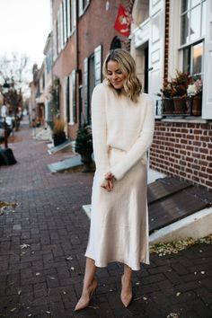 2 FESTIVE LOOKS WITH 1 SWEATER - Styled Snapshots Wedding Dress And Sweater, Winter Dress Rehearsal Outfit, Engagement Sweater Dress, Outfit Inspo Winter Dress, Bridal Skirt And Sweater, Sweater Dress 2022, Cold Weather Rehearsal Dinner Outfit, White Party Dress Winter, Satin Dress And Sweater Outfit